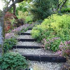 14 Fascinating Garden Steps That You Can Make In Your Free Time Stairs Garden Yard Sloped Garden Garden Stairs Garden Steps