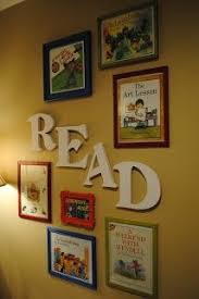Framed Children S Book Covers In A Book Nook We Ve Always Thought Of Book Covers As Art Could Do In My Classro Library Decor Classroom Library Book Display