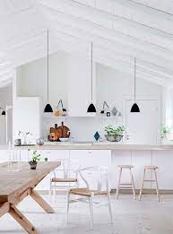 The small succulent lends a pop of warmth while helping to define the bathroom's nordic influence. Vaulted Ceiling Scandinavian Kitchen Renovation Scandinavian Kitchen Design House Interior
