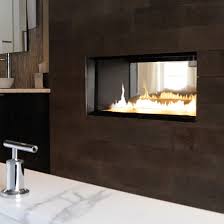 Choosing this ventless fireplace can reduce costs than traditional fireplaces with flues and chimneys. Fire Ribbon Vent Free Vu Thru Spark Modern Fires