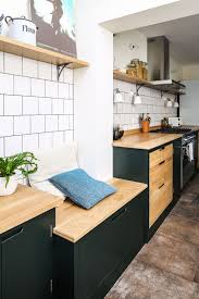 green industrial galley kitchen with