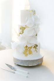 Gold Flecked Round Tiered Wedding Cake With White Fondant Flowers