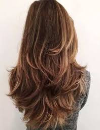 This is a look for women with a round small face who have wavy long hair. 50 Gorgeous Long Layered Hairstyles