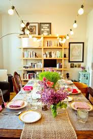Two story house with rain gutter too high for clips. 28 Ways To Use Those Magical String Lights Apartment Therapy