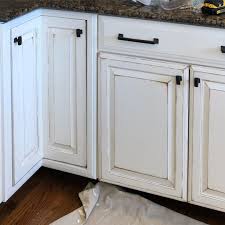 Distressed kitchen cabinets are achieved by a quick and easy faux finish technique you can do in a matter of hours. Hand Painted White Kitchen Cabinets Faux Distressed Accents Painted Treasures By Chelsea Paintedtreasuresbych Kitchen Cabinets White Kitchen Cabinets Kitchen