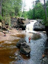This Magical Waterfall Campground In Wisconsin Is Unforgettable Wisconsin Waterfalls Wisconsin Vacation Wisconsin Travel