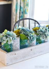 Elegant centerpiece for weddings and events. Rustic Spring Planter Box Centerpiece With Mason Jars Hydrangeas The Diy Mommy Planter Box Centerpiece Mason Jar Centerpieces Wooden Box Centerpiece