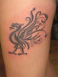Touch device users can explore by touch or with swipe gestures. Liverbird Tattoo