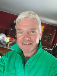 Silver-grey hair and bright green colours