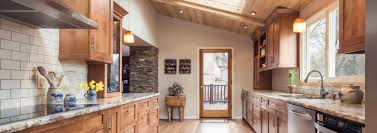 Raised panel door with slab drawer front. Rustic Kitchen Design Denver The Colorado Nest