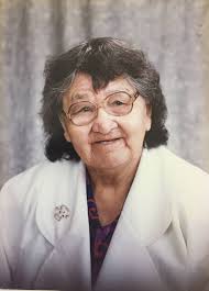 Singing celebrates school sign posts