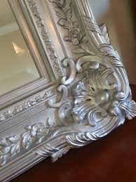 Make sure you lightly sand the surface with an abrasive block so that the paint adheres better after applying the rub n buff paste. Diy Black And Gold Mirror Novocom Top