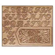 Mcdermott has made a long career carving letters in wood. 1 Craftaid Plastic Alphabet Template 72283 00 Leather Craft Patterns Leather Working Patterns Leather Carving