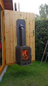 Using our hybrid technology, the survival hybrid has low 1.05 gm/hr emissions, and a 79.4% efficiency rating. Custom Wood Burner For Indoor And Outdoor Use Made In The Uk Trailer Decor Contemporary Wood Burning Stoves Wood Stove