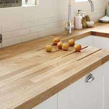 Calacatta gold quartz is a versatile. Oak Block 40mm Worktop Howdens Kitchens Oak Kitchen Worktops White Gloss Kitchen