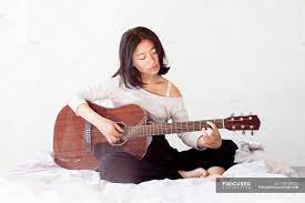 We did not find results for: Young Woman Playing Guitar While Sitting On Bed At Home Musical Instrument Blanket Stock Photo 178109722