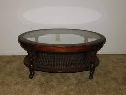 Made of solid walnut solid, sturdy, and handsome octagonal glass top fits directly into recessed lip octagonal cane bottom framed in solid walnut eight (8) turned baluster columns, which also server as legs arts & crafts style tongue and groove placement of cane bottom panel in the columns. Lot 112 Glass Top Coffee Table With Cane Bottom Auction By Sac Valley Auctions