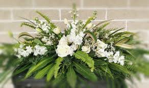 From you flowers offers funeral sprays for caskets overflowing with bright colored carnations and orchids. Casket Sprays Funeral Flowers Nelson