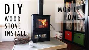 An outdoor fireplace while appealing could be stress causing and time consuming project. Diy Wood Stove Install In Mobile Home Youtube