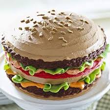 Burger Cake The Burgers Of This Cake Are A Dark Chocolate Frosting The Cheese And Tomatoes Are Tinted Frosting The Lettuce Lea Food Burger Cake Cake Recipes