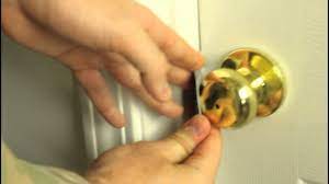 How to card a door. How To Unlock A Door With A Credit Card Youtube