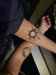 Tattoo Sun And Moon Tattoo On Her Hand Hand Tattoos Sun Tattoos Tattoos