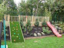 11 Gorgeous Pictures That Prove Sloped Yards Are Better Kid Friendly Backyard Sloped Backyard Backyard Playground