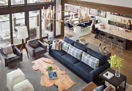 Brass bottle neck juxtaposes a clear bulbous base for a cool play on proportions. Gorgeous Mid Century Modern Inspired Mountain Home In Big Sky