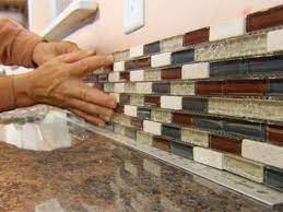 Super cheap stainless steel backsplash made with aluminum roof flashing!!! How To Install A Glass Tile Backsplash This Old House