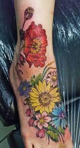 The style of the flower itself gives way to stunning watercolor flower tattoos, beautiful soft petals in marvelous shades of pink and peach. 49 Wildflower Tattoo On Foot Important Tattoo Ideas