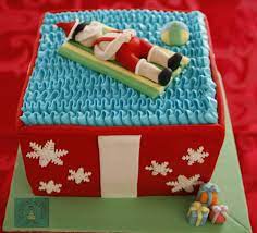 Either way, i love them. Christmas In July Cake Santa In The Pool July Birthday Christmas In July July Party
