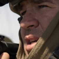 SPC Russell Garcia from B Co., 1ST Battalion, 17th Infantry, Fort  Wainwright, Alaska, fires an anti-tank weapon (AT-4) at a jeep in the  village of Simpsonville, Alaska during NORTHERN EDGE '98, an