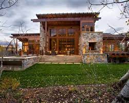 The design ties the home to its surroundings and enhances the ability to experience both home and nature together. Home Exterior With Stone Designs Rustic Exterior Home Designs With Stone Rustic House Plans Rustic Houses Exterior Stone House Plans