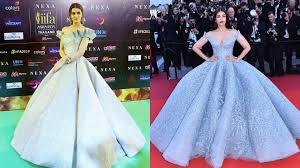 After the pageant, the beauty queen and the designer shared a photo of the fabulous gown on social media. Kriti Sanon S Iifa Dress Looks A Lot Like Aishwarya Rai S Cannes Gown Hindustan Times