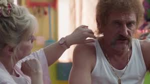 Around 00:53:42, jeff is holding the bottle's neck with his right hand. La Chaine En Or De Jeff Tuche Jean Paul Rouve Dans Les Tuche 3 Spotern