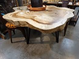 We did not find results for: Wooden Dining Table Features Black Metal V Legs And A Live Edge Top