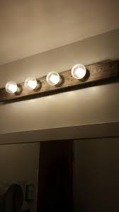 Transporting you to the dramatic, contemplative mood of the romantic era, arlington is an all crystal chandelier with elaborately cut crystal column pieces, dishes, and bobeches. Driftwood Led Lights From Old Hollywood Bathroom Fixture Bathroom Light Fixtures Diy Light Fixtures Light Fixture Covers
