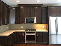 Kraftmaid Vantage Cabinetry Saddle On Cherry Wood Kitchen Design Cabinetry Design Cool Kitchens