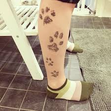 The design of a dog memorial tattoo can range in style from simple to complex, from black and white to vibrant colors. 75 Heart Melting Dog Print Tattoos