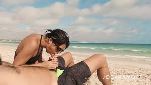 Blowjob on the public beach - risky cumshot with people close by