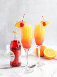 The first thing you'll want to do is make sure you have a pretty pitcher to serve. Sunrise Mimosa Simply Made Recipes