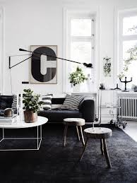Monochrome Is Nothing To Fear Blacks And Greys Are Perfect For A Modern City Black Carpet Living Room Living Room Scandinavian Scandinavian Design Living Room