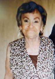 Gloria E. Martínez...