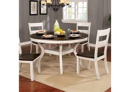 The round top is supported by a pedestal base with curved legs. Juniper Antique White Dining Table Cohen S Furniture New Castle De