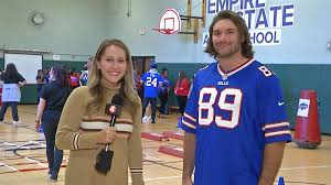 Tommy Sweeney has a ball with Buffalo kids