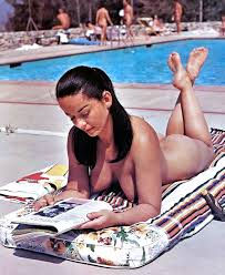 DSun on X: Nude goddess Diane Webber getting in a good nude read by the  pool t.co7jbZcMTCLX  X
