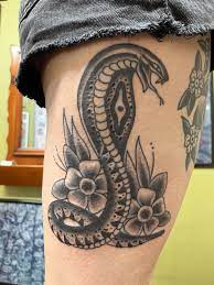The technique is defined by its use of thick bold lines, minimal shading, and a limited but very bright color palette. Snake Tattoo Americantraditional Americantraditionaltattoo Snaketattoo Traditional Snake Tattoo Traditional Tattoo Black And White Snake Tattoo