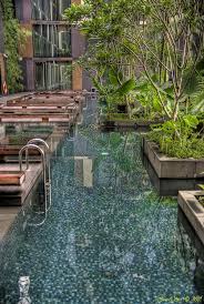 There's a rooftop pool, mesmerizing art, luscious gardens, and even a free movie theater. Sin Singapore Changi Airport Page 56 Singapore Changi Airport Singapore Garden Changi