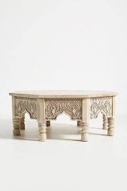 Carved wood coffee table part sculpture, part table, all artisanal. Raaz Octagon Carved Wood Storage Coffee Table
