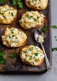 43 best holiday party appetizers saveur from resizer.shared.arcpublishing.com. Crab Appetizers Recipe Crab Artichoke Toasts